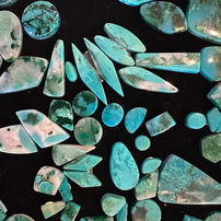 Polished turquoise stones in various shapes