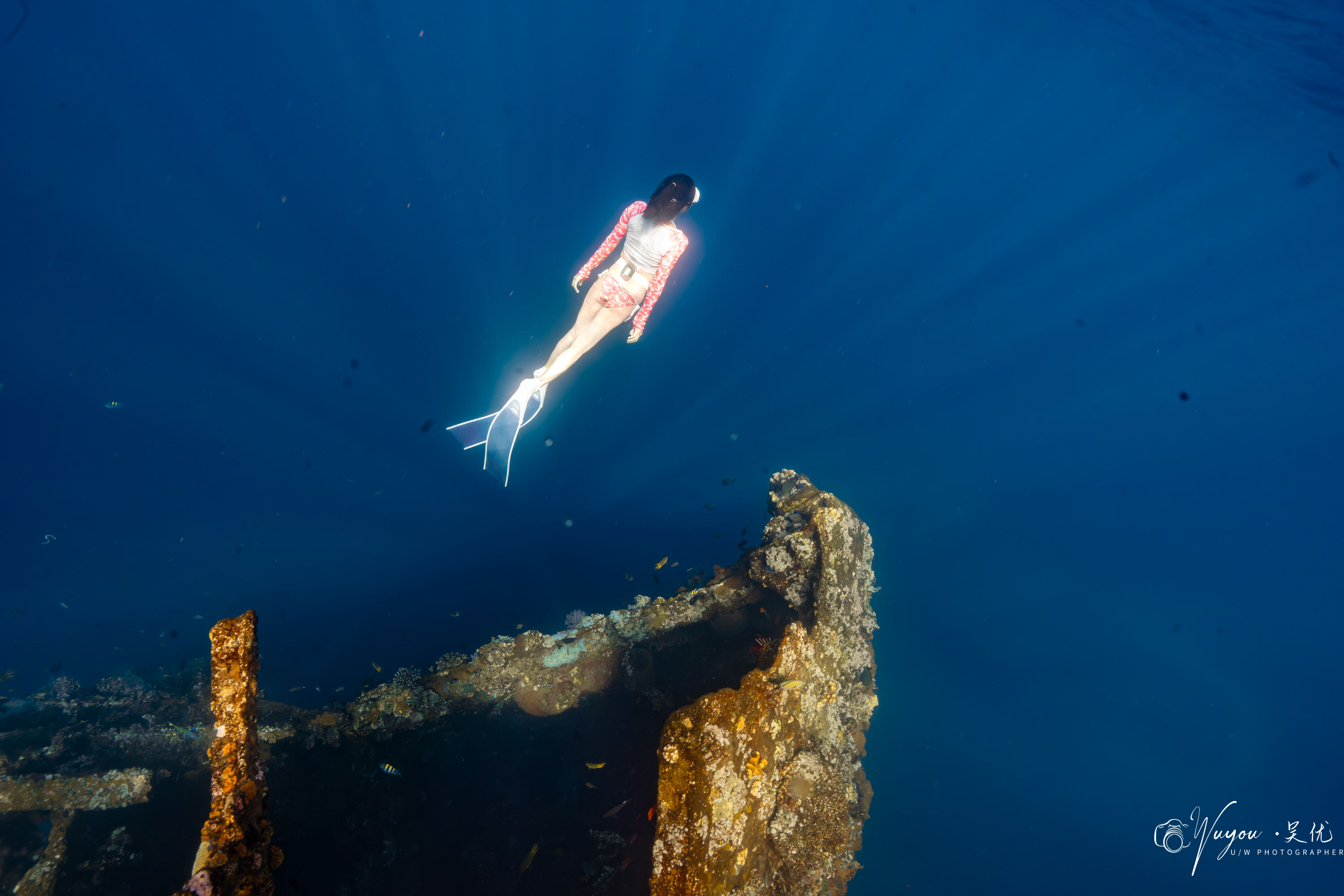 Relaxed snorkeling experience over vibrant coral reefs in Bali