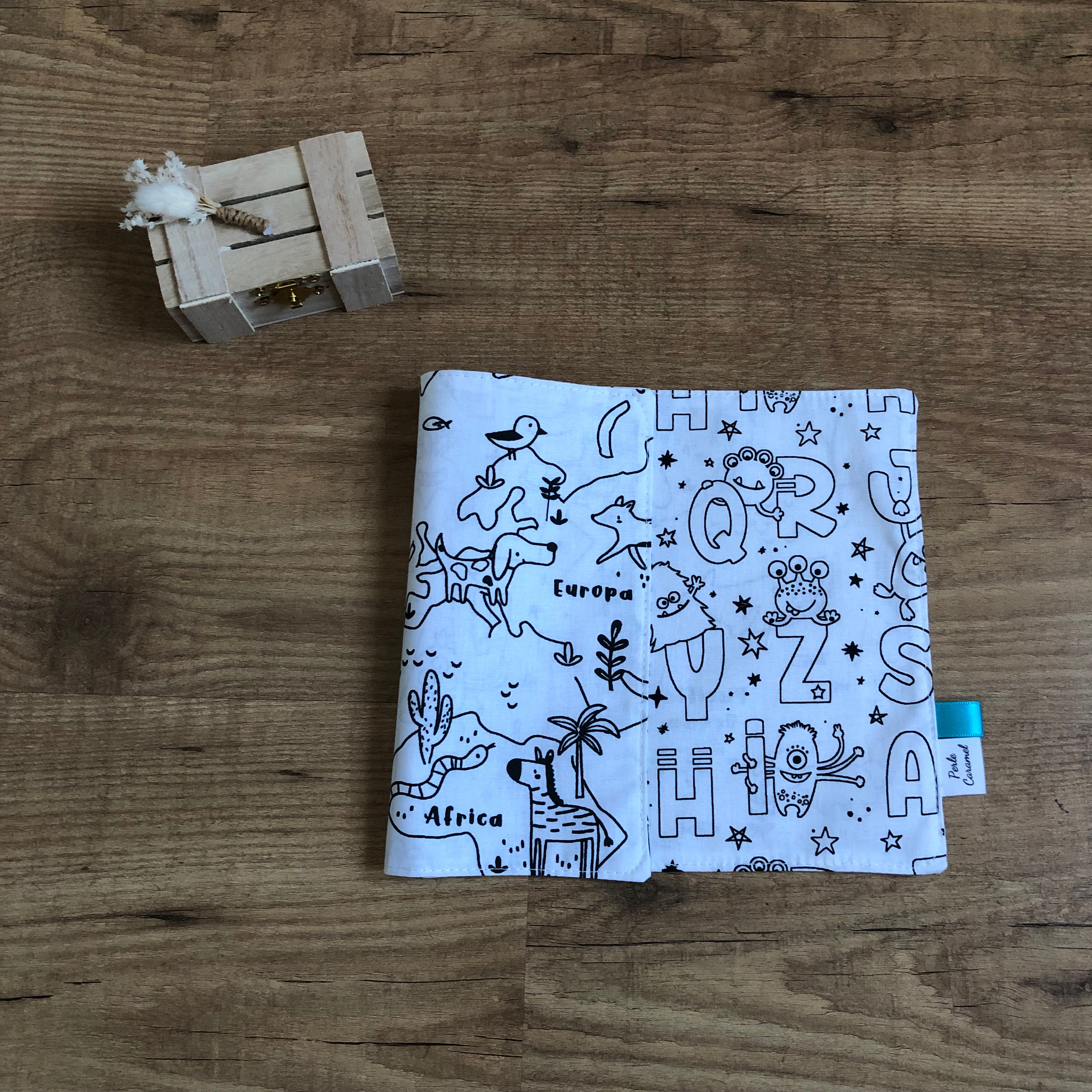 Feuille de coloriage lavable motif mappemonde/alphabet