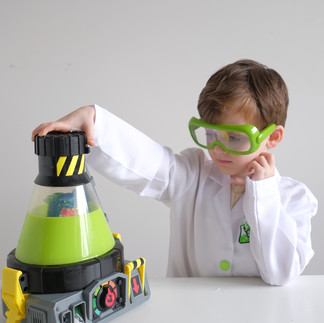 Boy Playing With Shark Toy