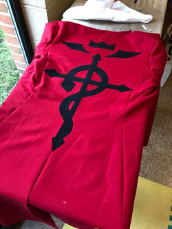 Applique attached to coat