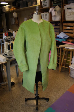 Coat completion front