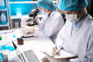 medical-healthcare-researcher-and-scientist-writing-experiment-detail-on-paper-in-clipboar
