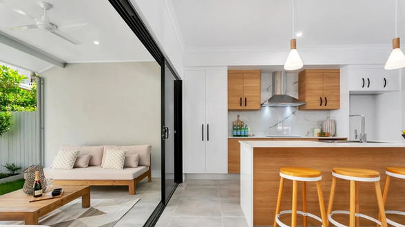 A unique chefs kitchen with all modern appliances including an island bench adjoined to a flexible indoor /outdoor dining area.