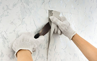 depositphotos_144920137-stock-photo-removing-of-old-wallpapers-from-1.jpg