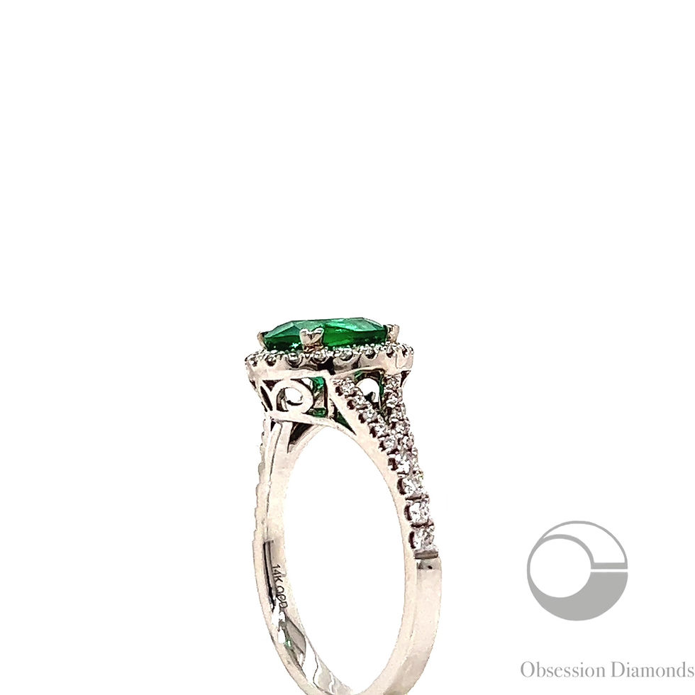 Thumbnail: Diamond Halo Oval Emerald Ring
