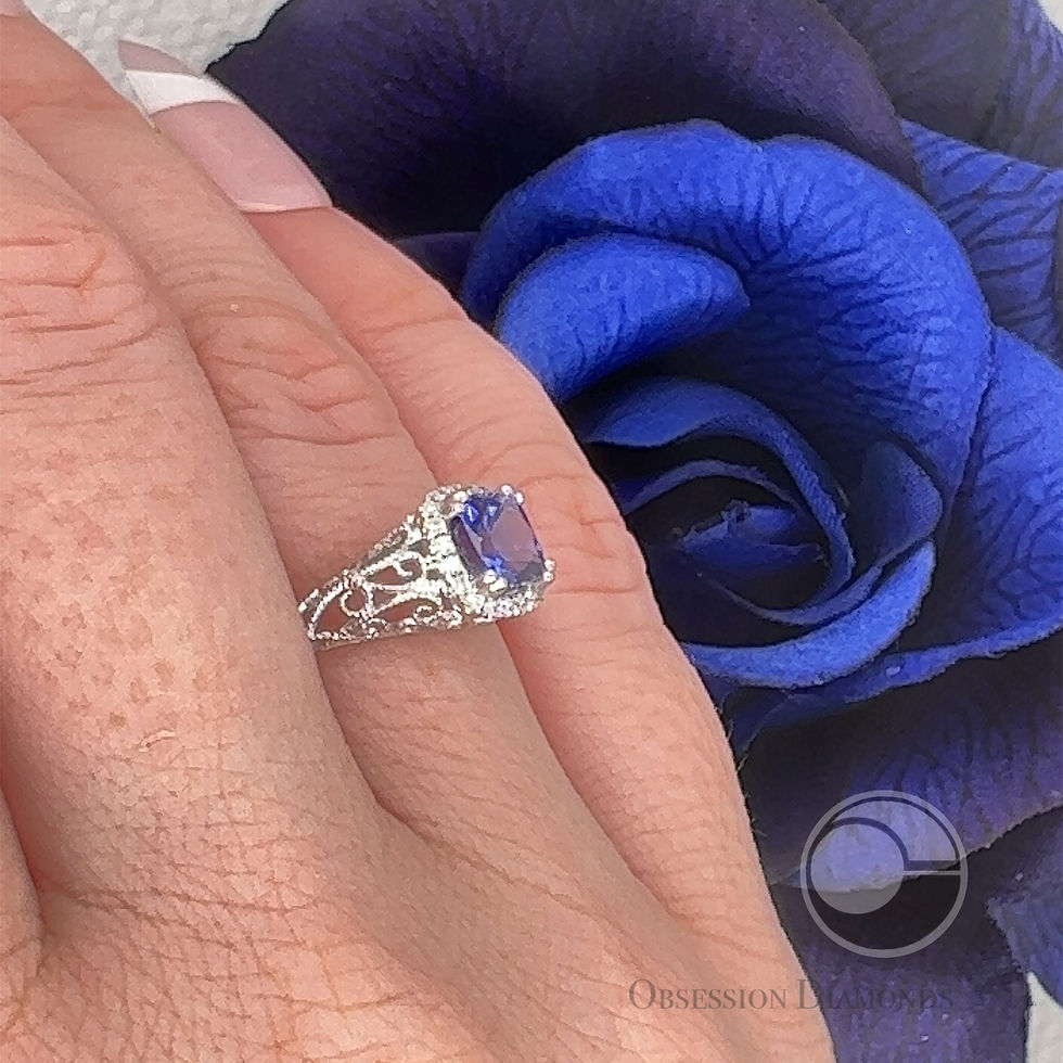Thumbnail: Cushion-cut Tanzanite and Diamond Vintage-Style Scroll Ring