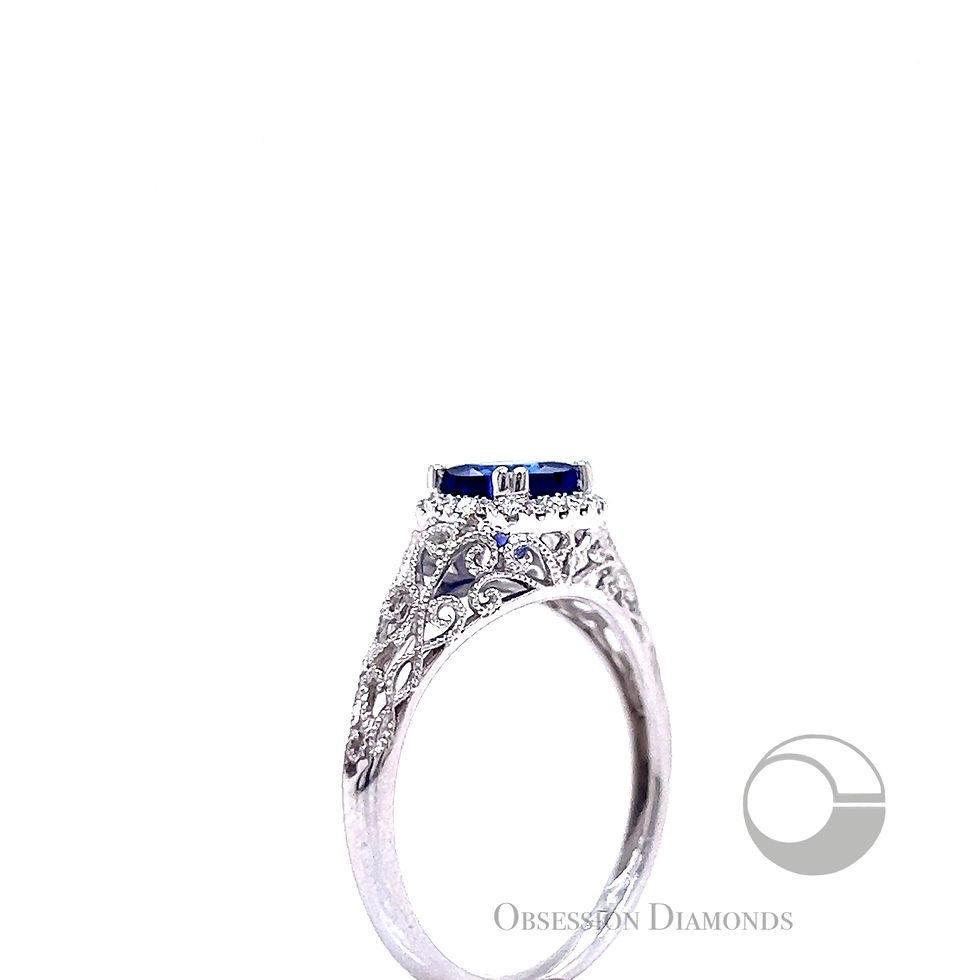 Thumbnail: Cushion-cut Tanzanite and Diamond Vintage-Style Scroll Ring