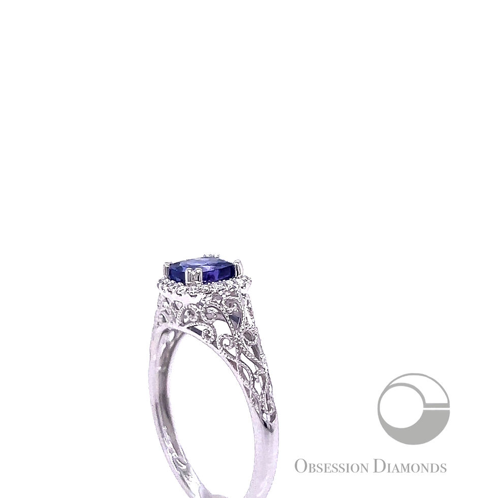 Thumbnail: Cushion-cut Tanzanite and Diamond Vintage-Style Scroll Ring