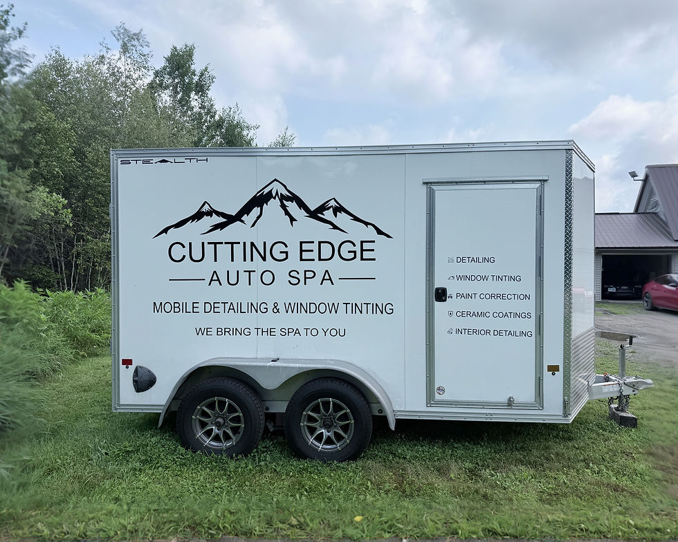 IMG_3673: Cutting Edge Auto Spa trailer with custom vinyl graphics and lettering