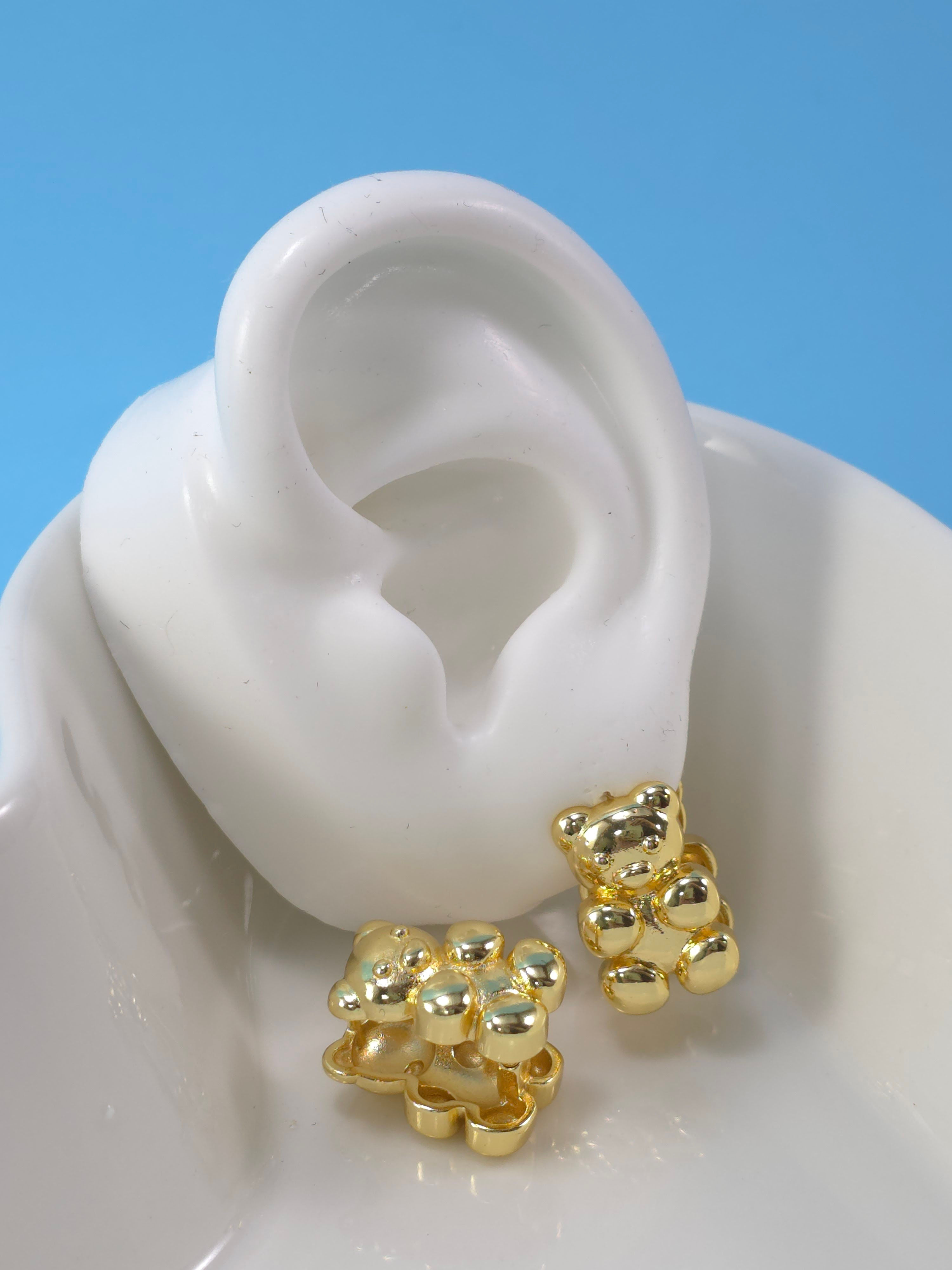 Aretes dorados de oso