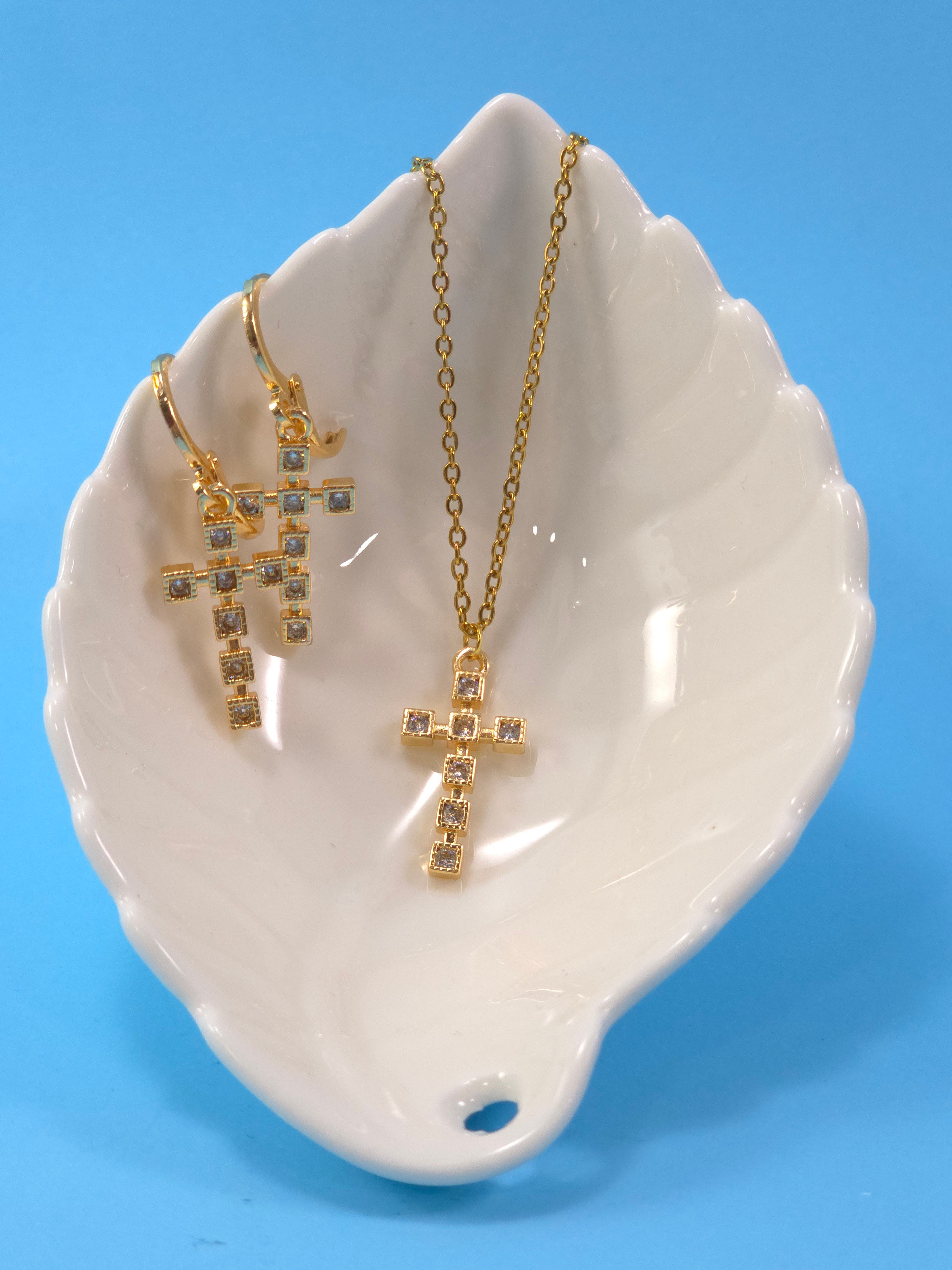 Set de collar y aretes con dije de cruz de brillantes