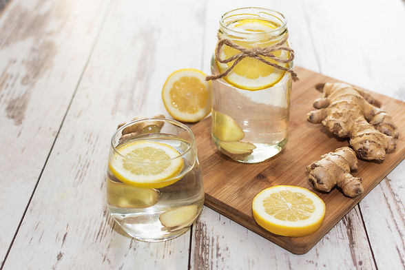 Ginger with lemon detox water in the mor