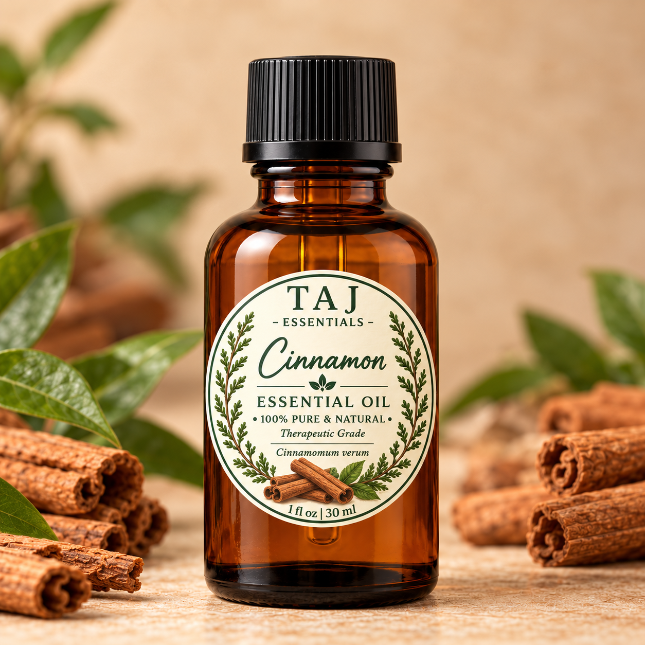 TAJ Essentials Cinnamon essential oil in a 1 fl oz amber bottle with circular label