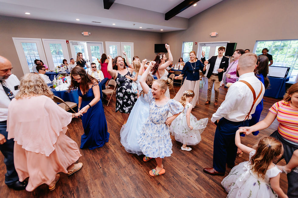 Family dancing at wedding reception in the DMV