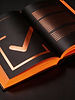 freepik__cinematic-closeup-of-open-book-with-premium-black-__78354.jpeg