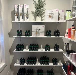 Holiday product shelves at L'Elegance Salon