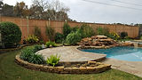 Katy Fence Repair newly finished wooden fence behind a backyard pool in Katy, TX showcasing expert craftsmanship, privacy, and elegant outdoor design.
