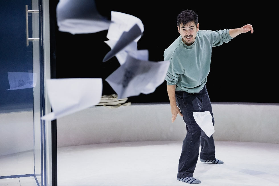 Man throwing papers in frustration