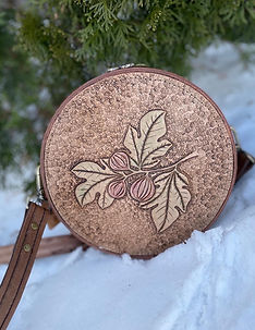 Custom designed and handcrafted leather bag with fig branches.