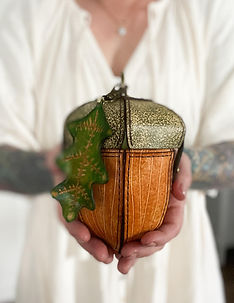 Handcrafted leathe acorn crossbody bag inspired by the beauty of the forest.