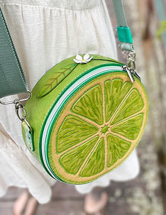 Handcrafted leather lime slice bg with vibrant citrus design.