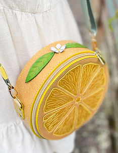 Handcrafted leather leamon slice bag inspired by summer.