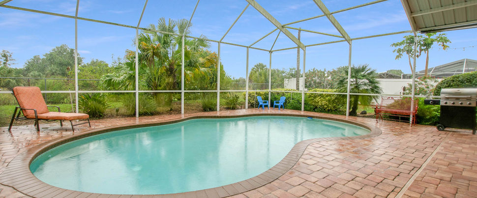 pool, brick pavers, screened in pool enclosure