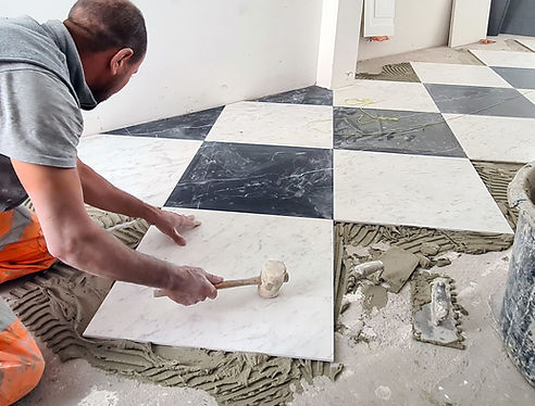 Pose de carrelage en damier – Rénovation d’intérieur à Waterloo