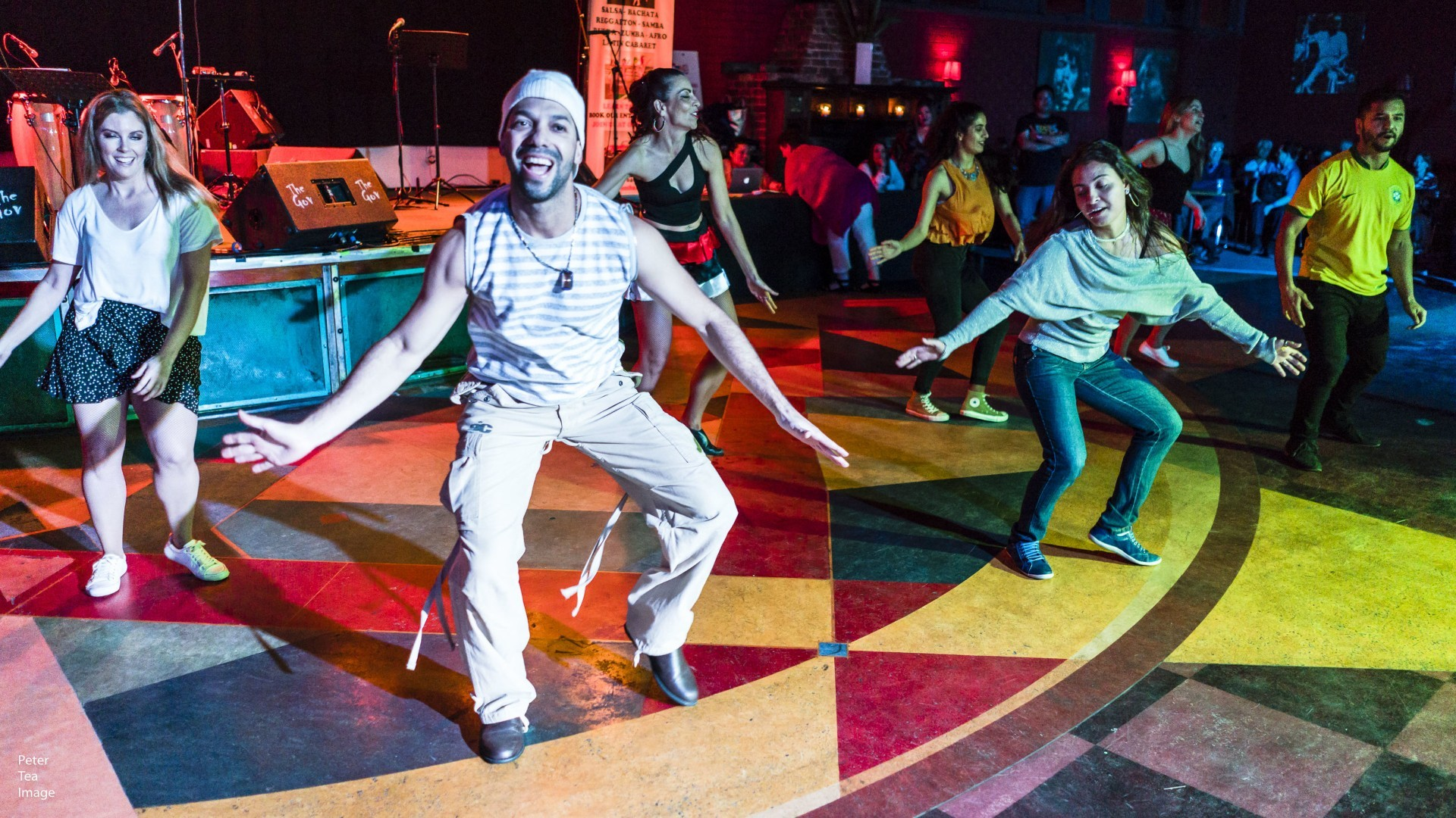 Cruz and dancers.png