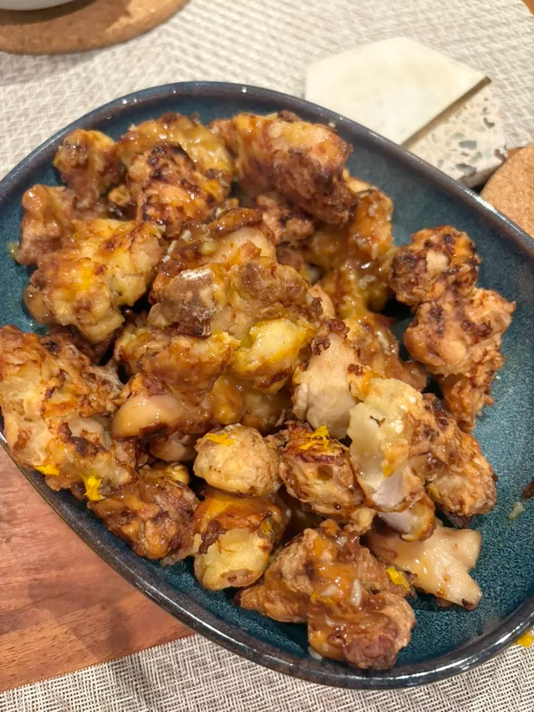 fried chicken in a blue ceramic bowl