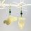 Thumbnail: Mismatched Earrings - Lotus Bud & Leaf In Gold Coloured Metal With Jade Beads