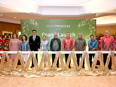 Distinguished guests and executives mark the grand opening of Dusit Princess Melaka with a traditional ribbon-cutting ceremony