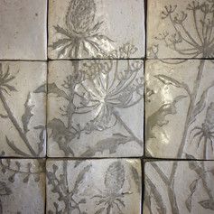 Bespoke stoneware kitchen splashback, handmade tiles with sgraffito decoration