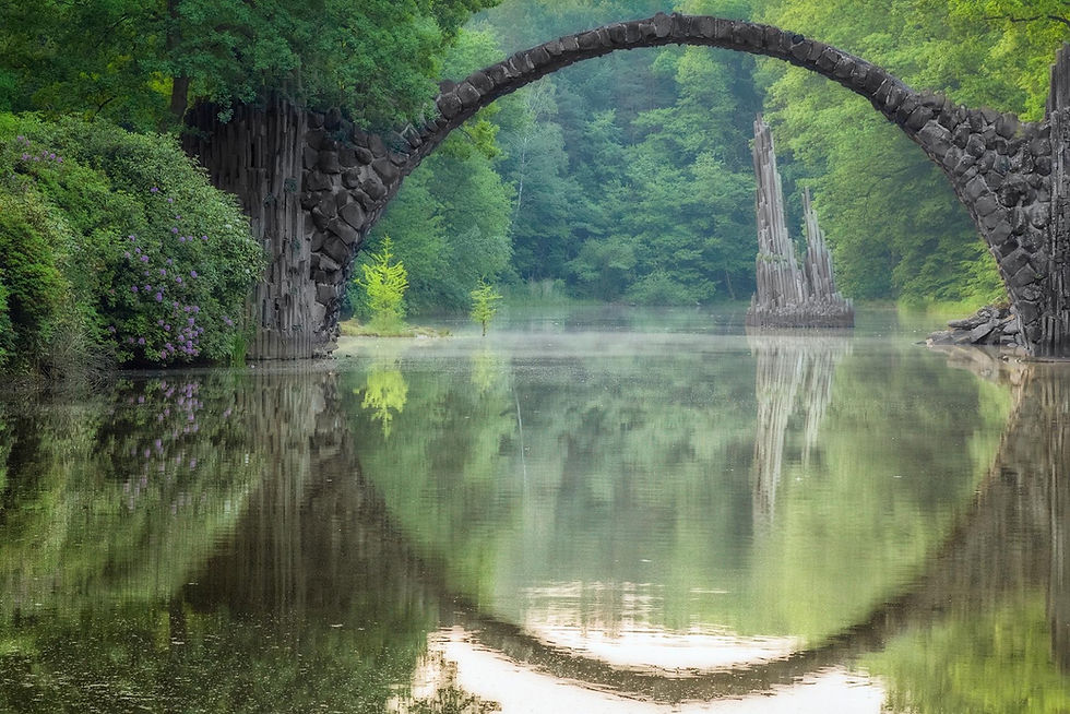 arch-bridge-in-kromlau-picture-id538162756.jpg
