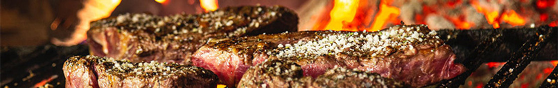 cooking-grilled-meat-over-a-wood-fire.jpg