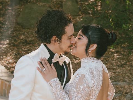 Newlyweds sharing a precious moment in a beautiful setting