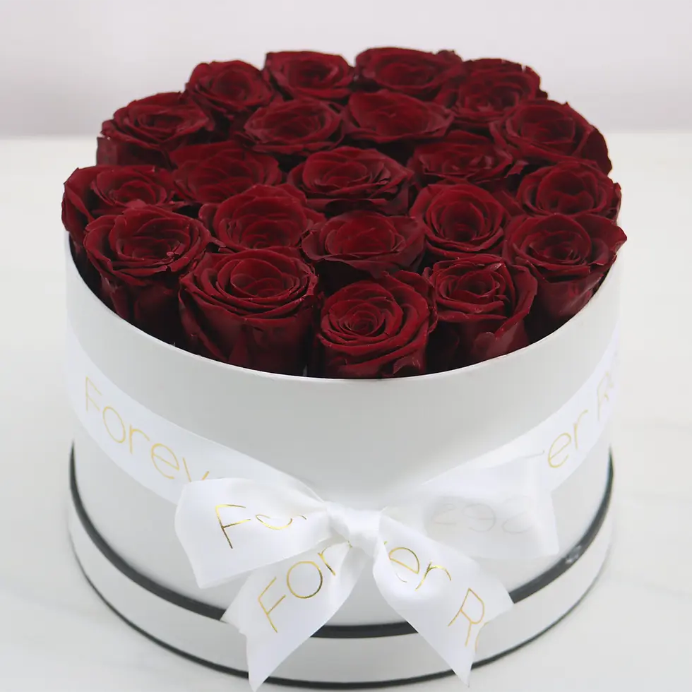 17 burgundy roses in a black and white box