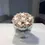 Thumbnail: A mix of white eternal roses and dried flowers in a silver metal box.
