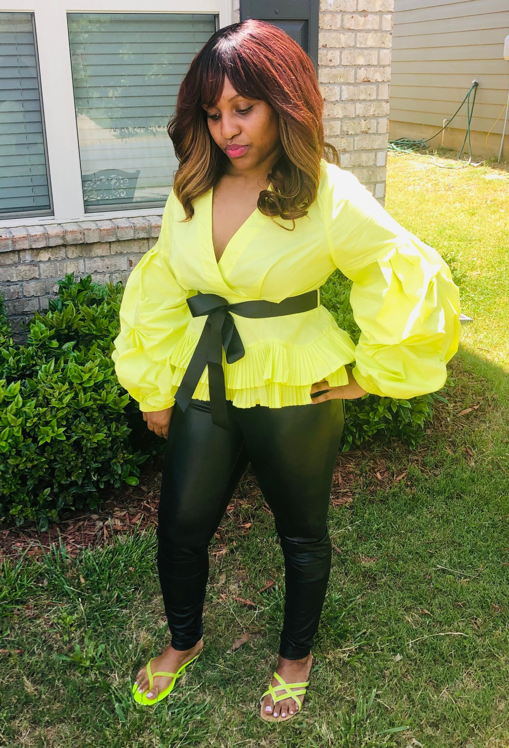 Photo of model wearing Bumble Bee Peplum Top