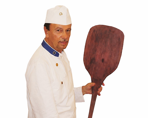 Evandro Taddei maestro pizzaiolo con pala simbolo del Metodo professionale Academy