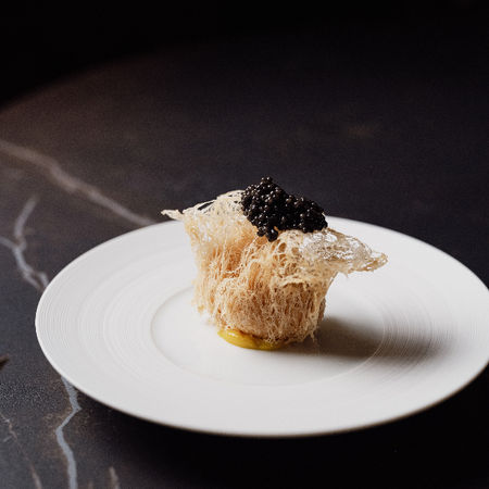 wu gok met fluffy dumpling, marigold ei, kaviaar