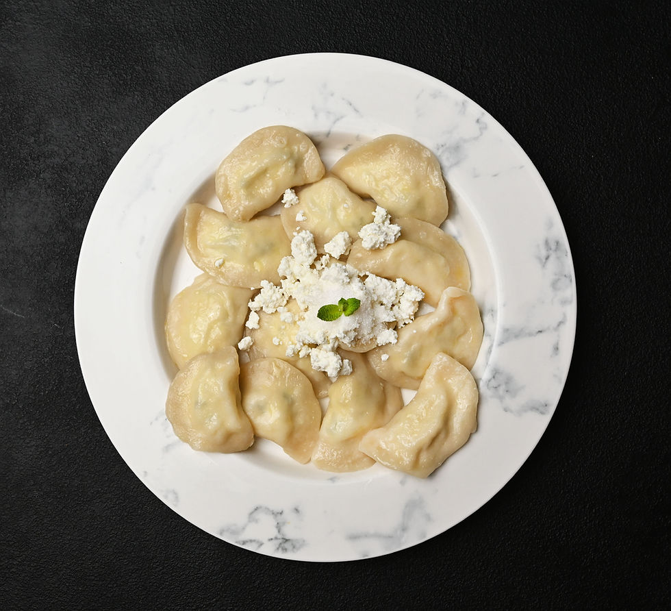 Sweet cheese varenyky (dumplings)
