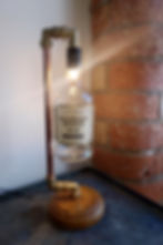Steampunk industrial copper pipe bottle lamp