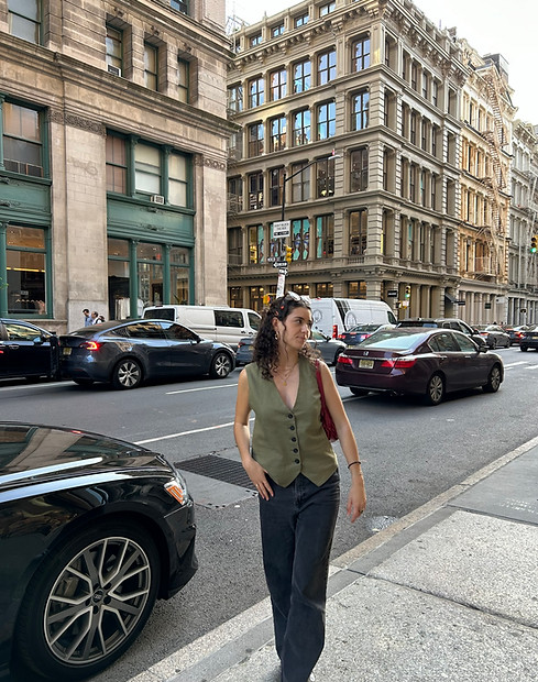 International marketing student in an urban setting, showcasing a modern business profile, creativity  in city exploration 