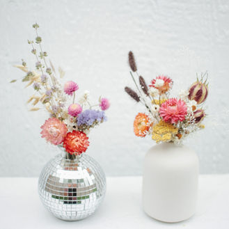 Dried flower arrangements in vases