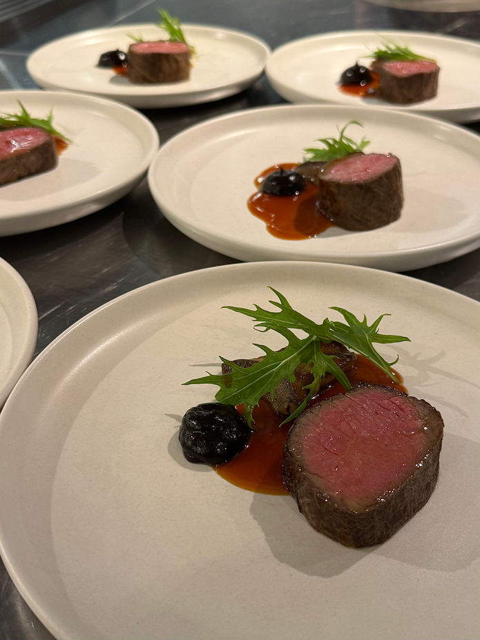 Private chef preparing a tasting menu in NYC