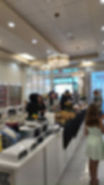 Modern Nail Salon Baton Rouge interior with customers