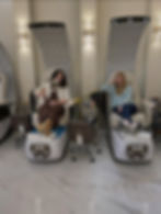 Smiling women in pedicure chairs at a Nail Salon Baton Rouge.