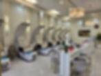 Modern Nail Salon Baton Rouge interior with pedicure chairs